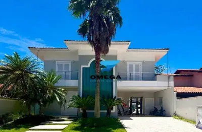 Casa à venda em condomínio jardim acapulco no guarujá i omega imoveis