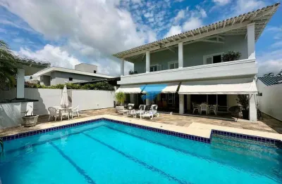 Casa à venda em Condomínio Jardim Acapulco no Guarujá | Omega Imóveis