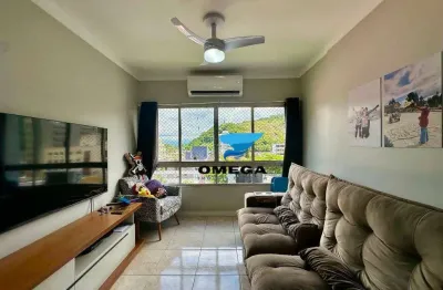 Apartamento reformado à venda na Praia das Pitangueiras no Guarujá | Omega Imóveis