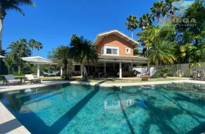 Casa à venda no condomínio jardim acapulco no guarujá | omega imóveis