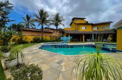 Casa à venda no condomínio jardim acapulco no guarujá | omega imóveis