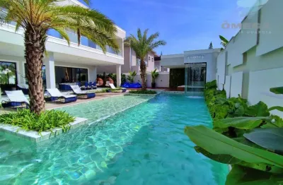 Casa à venda no condomínio jardim acapulco no guarujá | omega imóveis