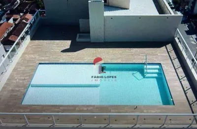 Belíssimo apartamento de frente para o mar , em praia grande , sp .
