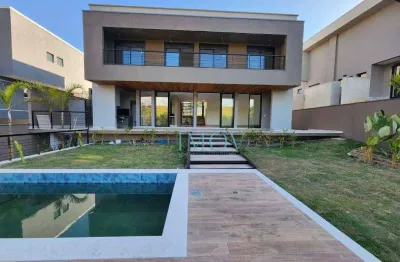 Sobrado com 4 dormitórios à venda, 384 m² por r$ 4.600.000,00 - condomínio reserva do paratehy - são josé dos campos/sp