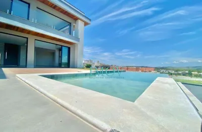 Sobrado Condomínio Colinas do Paratehy Norte - 4 Suítes - 416m²