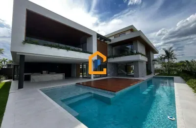 Casa contemporânea com vista pedra da gávea à venda no condomínio alphaville, na barra da tijuca