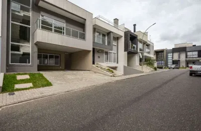 Casa em condomínio fechado com 4 quartos à venda na Rua Maria Luiza Bazzani Natal, 381, Uberaba, Curitiba por R$ 2.670.000