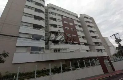 Apartamento com 3 dormitórios, sendo 1 suíte, e sacada com churrasqueira.