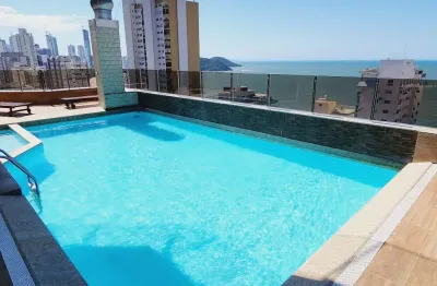 Apartamento na quadra do mar a 90 metros da praia central de bc, possui 3 quartos, prédio com lazer completo no rooftop