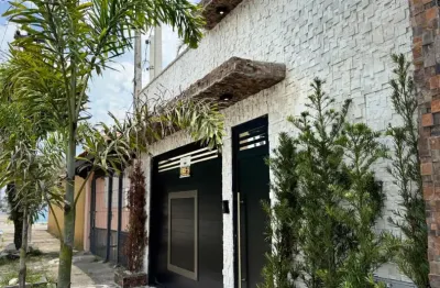 Linda casa alto padrão com piscina a 400 metros da praia bairro caiçara