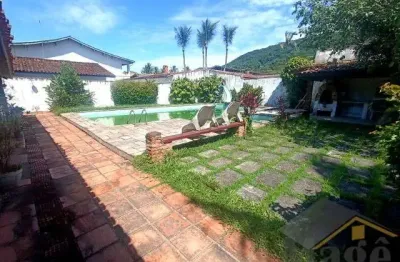 Casa térrea com piscina e churrasqueira a venda na praia do guaiúba - ref.: 5587