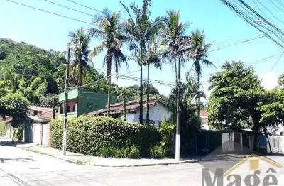 Excelente locação, terreno de esquina com 566 m² com 03 casas terreas individuais para venda na praia do tombo - ref.: 5158