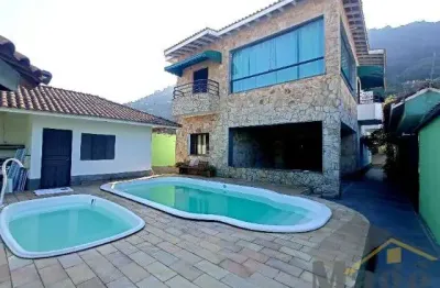 Sobrado com 05 suítes e ampla área de lazer com piscina e churrasqueira na praia do guaiuba - ref.: 4737