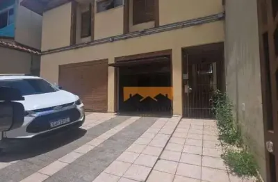 Casa com 3 dormitórios, 300 m² - venda por R$ 1.100.000 ou aluguel por R$ 12.610/mês - Vila Valparaíso - Santo André/SP