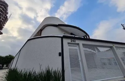 Casa em condomínio fechado com 2 quartos à venda no Solemar, Praia Grande 