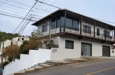 Sobrado com sala comercial e piscina à venda no bairro vila lenzi – jaraguá do sul
