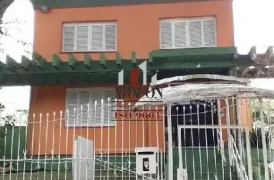 Casa com 4 quartos à venda na avenida pereira passos, 936, vila assunção, porto alegre por r$ 799.000