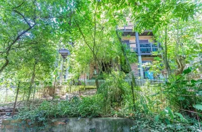 Casa com 4 quartos à venda na rua altos da amapá, 100, vila nova, porto alegre por r$ 700.000