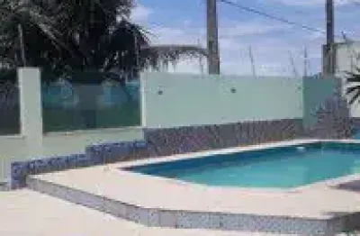 Casa no bairro cibratel 2, em itanhaém - ficando frente ao mar, em rua pavimentada.