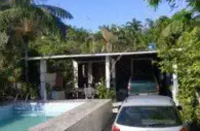 Chácara no bairro vila loty, em itanhaém - sendo lado serra, em rua de terra.