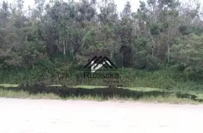 Terreno à venda no bairro jardim coronel, em itanhaém ** terreno medindo 420 m² de área total.