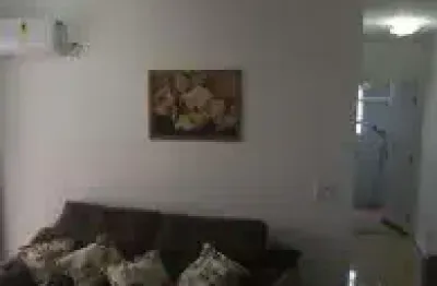 Apartamento no bairro guapura, em itanhaém - possui elevador, piscina, mini academia, brinquedoteca, salão de jogos, salão de festas, mini campo e sacada.