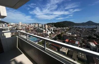 Apartamento novo com varanda, 2 quartos e 1 vaga no Centro de São Vicente