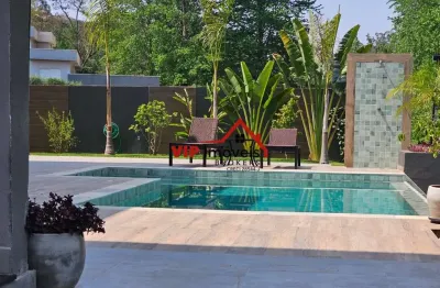 Linda casa alto padrão no condomínio terras caxambu com 4 suítes