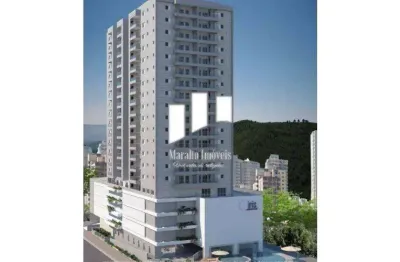 Apartamento pé na areia com sacada gourmet em praia grande sp.