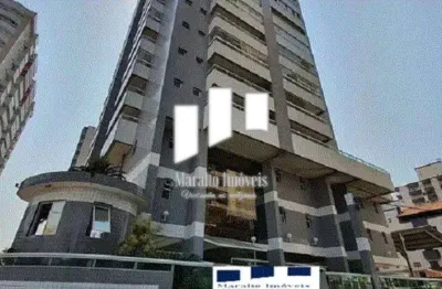 Apartamento em praia grande com 3 dormitórios, 2 vagas de garagem e sacada.