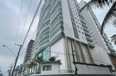 Apartamento com 3 suítes em frente a praia do caiçara com sacada gourmet vista mar definitiva.