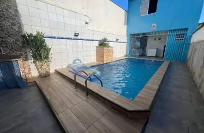 Casa com piscna e edícula na mirim em praia grande sp