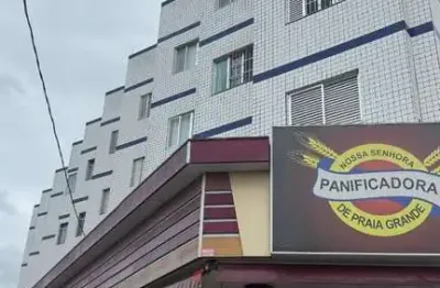 Apartamento à venda em praia grande-sp, caiçara: 1 quarto, 1 sala, 1 banheiro, 1 vaga de garagem, 45m² de área.