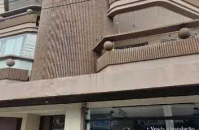 Apartamento com 2 quartos, 1 vaga, uma sacada com churrasqueira no centro de bc