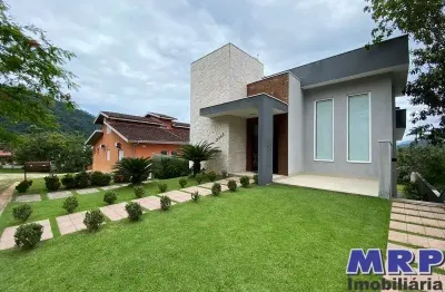 Casa à venda em condomínio na praia da lagoinha. ubatuba - sp. alto padrão.