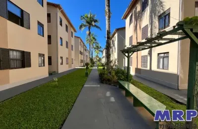 Apartamento a venda em ubatuba, com 2 dormitórios, sendo 1 suíte , dentro de condomínio a 400 metros da praia do sapê.