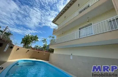 Apartamento à venda na praia da lagoinha em ubatuba. condomínio com piscina. 2 quartos