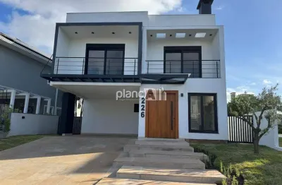 Casa em condomínio alphaville gravataí à venda, com 265,22m², 3 quartos 3 suítes - alphaville - gravataí / rs por r$ 2.550.000,00