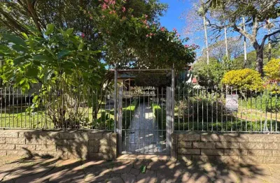 Terreno com chalé à venda no centro de dois irmãos/rs