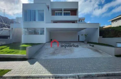 Casa com 3 dormitórios à venda, 370 m² por r$ 3.080.000,00 - condomínio residencial jaguary - são josé dos campos/sp