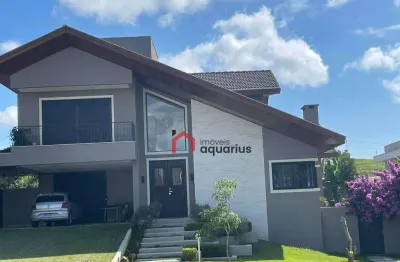 Sobrado com 4 dormitórios à venda, 480 m² por r$ 4.800.000,00 - condomínio reserva do paratehy - são josé dos campos/sp