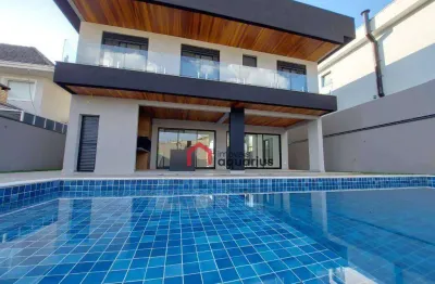 Sobrado com 4 dormitórios à venda, 350 m² por r$ 2.990.000,00 - condomínio residencial jaguary - são josé dos campos/sp