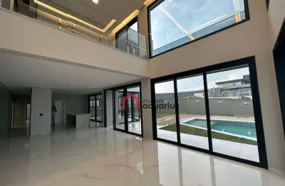 Sobrado com 5 dormitórios à venda, 600 m² por r$ 7.300.000,00 - condomínio reserva do paratehy - são josé dos campos/sp