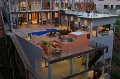 Sobrado com 8 dormitórios à venda, 1200 m² por r$ 7.800.000 - escarpas do lago - capitólio/mg