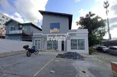 Excelente casa comercial de esquina com 4 vagas de estacionamento no bairro da vila mathias em santos