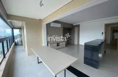 Apartamento 2 dormitórios com 1 suíte e varanda integrada na ponta da praia em santos
