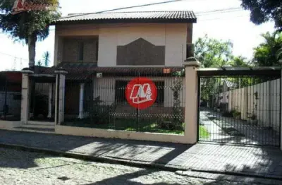 No bairro ipanema, casa de 274 m²,4 dormitórios, suítes, vagas e piscina.