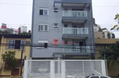 No menino deus ,cobertura 2 dormitórios, suíte e 2 vagas.