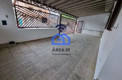Casa à venda no centro com 3 dormitórios, 2 banheiros, sala, cozinha, 2 vagas na garagem em caragua