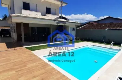 Linda casa à venda no jardim britânia - 4 dormitórios, sendo 2 suítes, banheiro, sala com 2 ambient